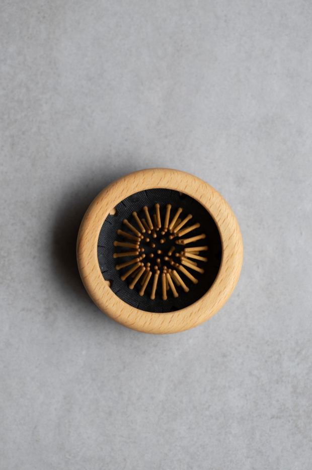 Peek-a-boo Hair Brush